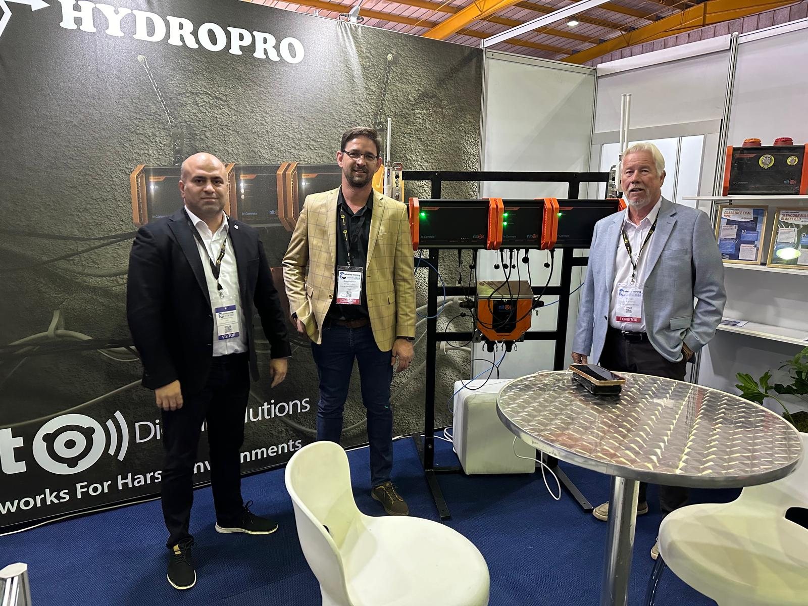 Meeting at an industrial technology stand